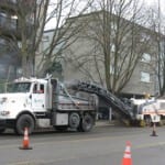 crews grind off old asphalt