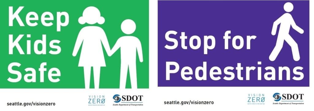 Two signs: Keep Kids Safe (Left), and Stop for Pedestrians (Right). These signs are a part of the Vision Zero campaign.