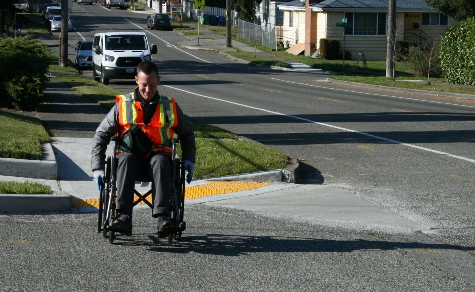 Road engineer using a wheelchair in the street
