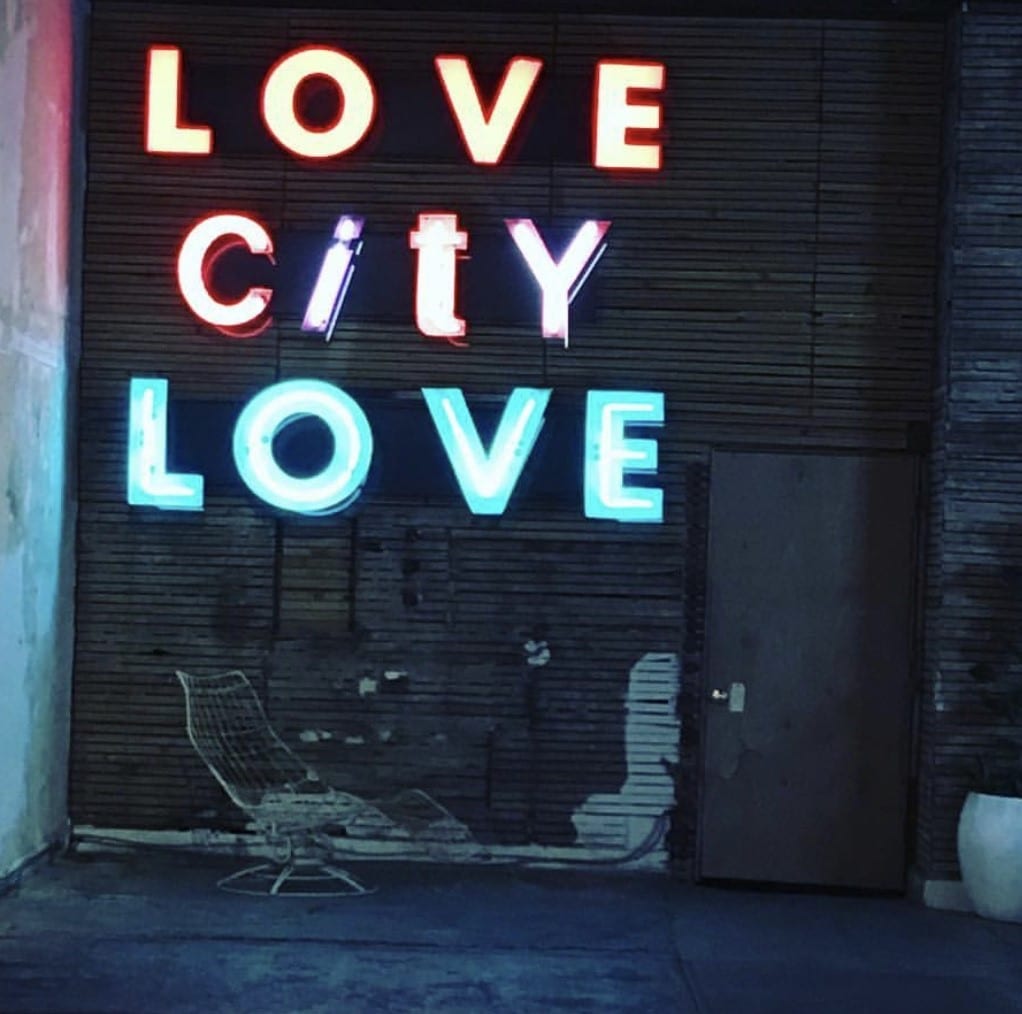 Sign that's reads "Love City Love"