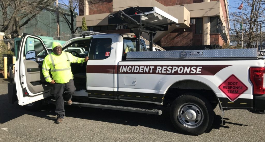SRT member Marcus Potts standing by a Incident Response truck.