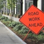 A photo of a road work ahead sign.