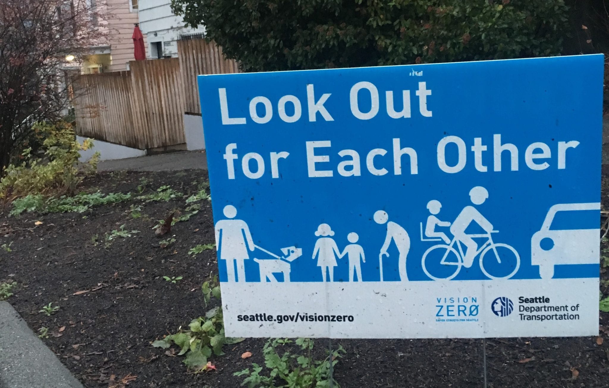 Vision zero sign placed in a community member's yard.