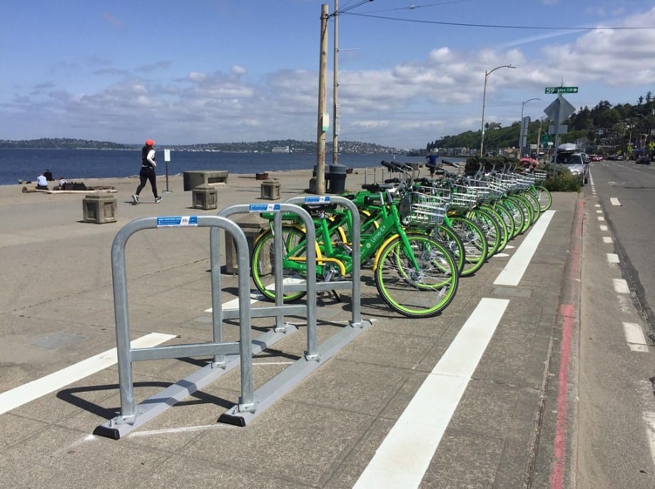 A photo of parked lime bikes on bike racks. Photo by SDOT Flickr.