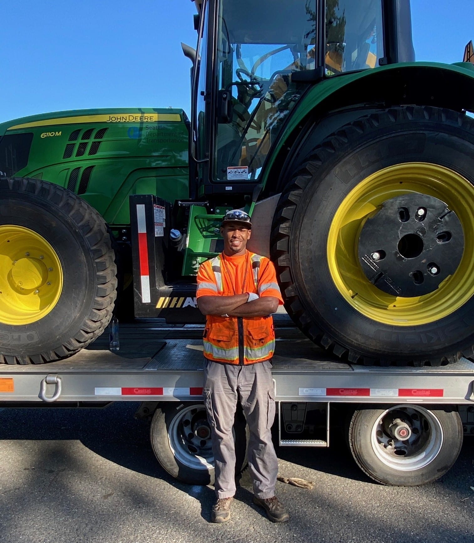 Patrick Carter with one of the tractors he drives | Photo by Ken Ewalt