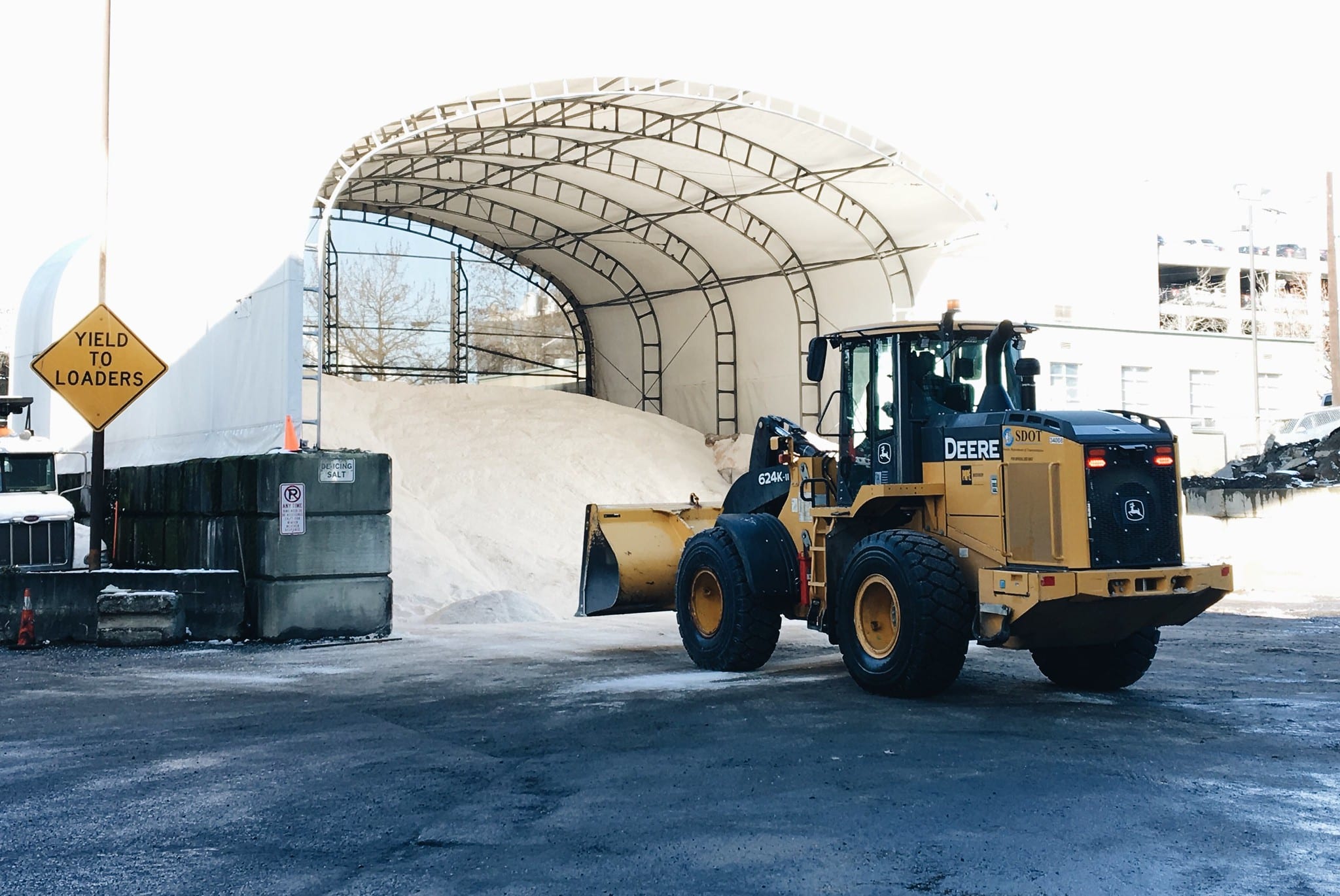 Operating the equipment that loads salt trucks | Photo by Jeanne Clark and Dongho Chang on SDOT Flickr