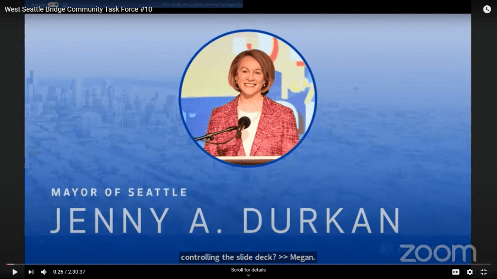 Image of Powerpoint slide. Blue background is shown, with transparent image of downtown Seattle in the background. Image of Mayor Durkan in a circle is in the middle of the slide. Text is in white and reads, "Mayor of Seattle Jenny A. Durkan."