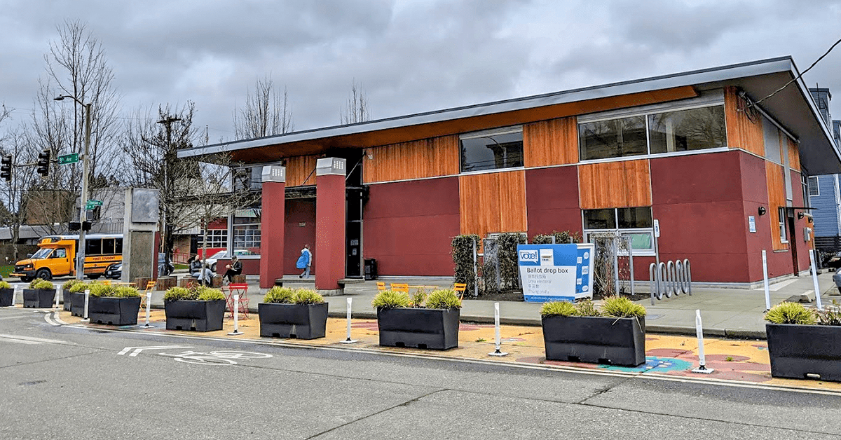 Art, greenery, and additional seating next to South Park Library. Photo Credit: SDOT Flickr