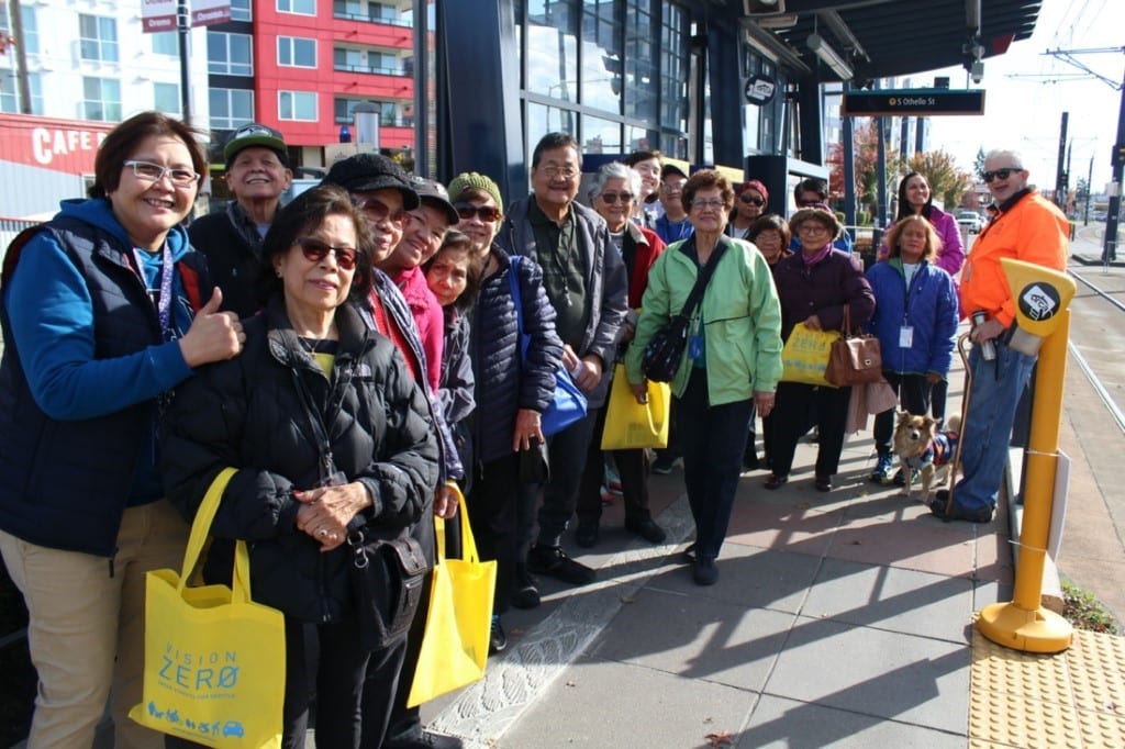 People gathered at a Seattle Streetcar station.