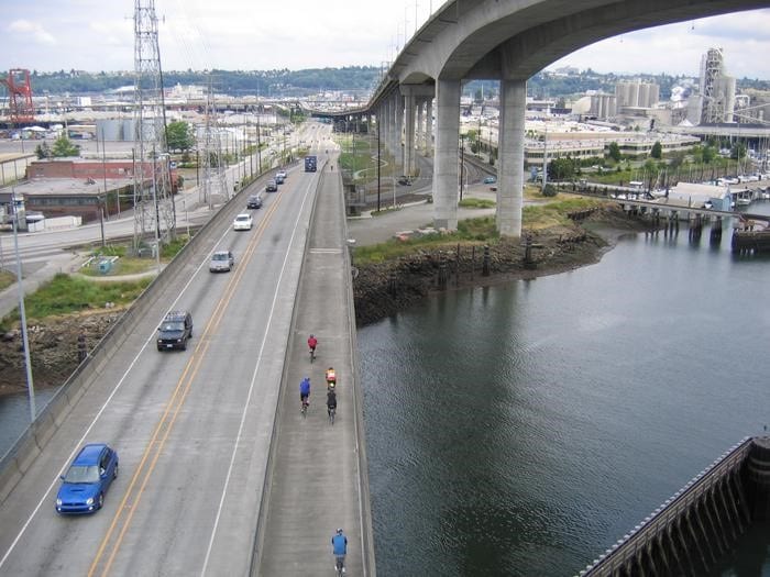 The West Seattle Low Bridge viewed from above. Cars and people biking and walking are shown. This photo was taken prior to the closure of the West Seattle High Rise Bridge.