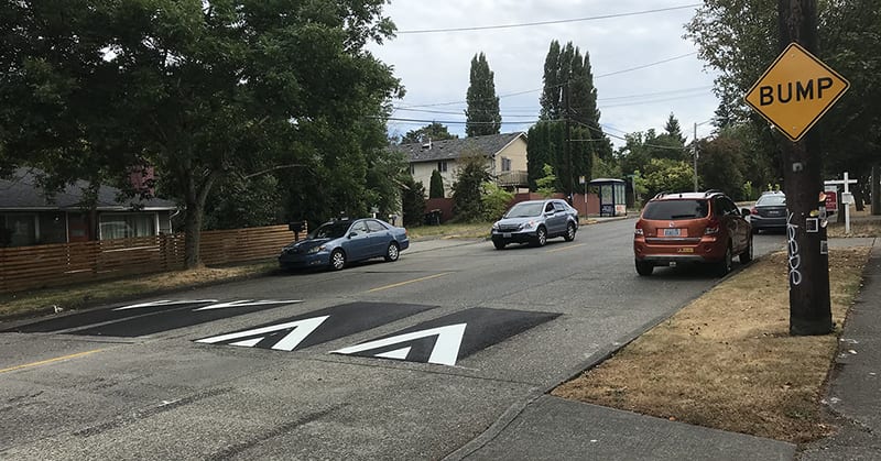 Photo of street in Highland Park with new traffic calming speed cushions