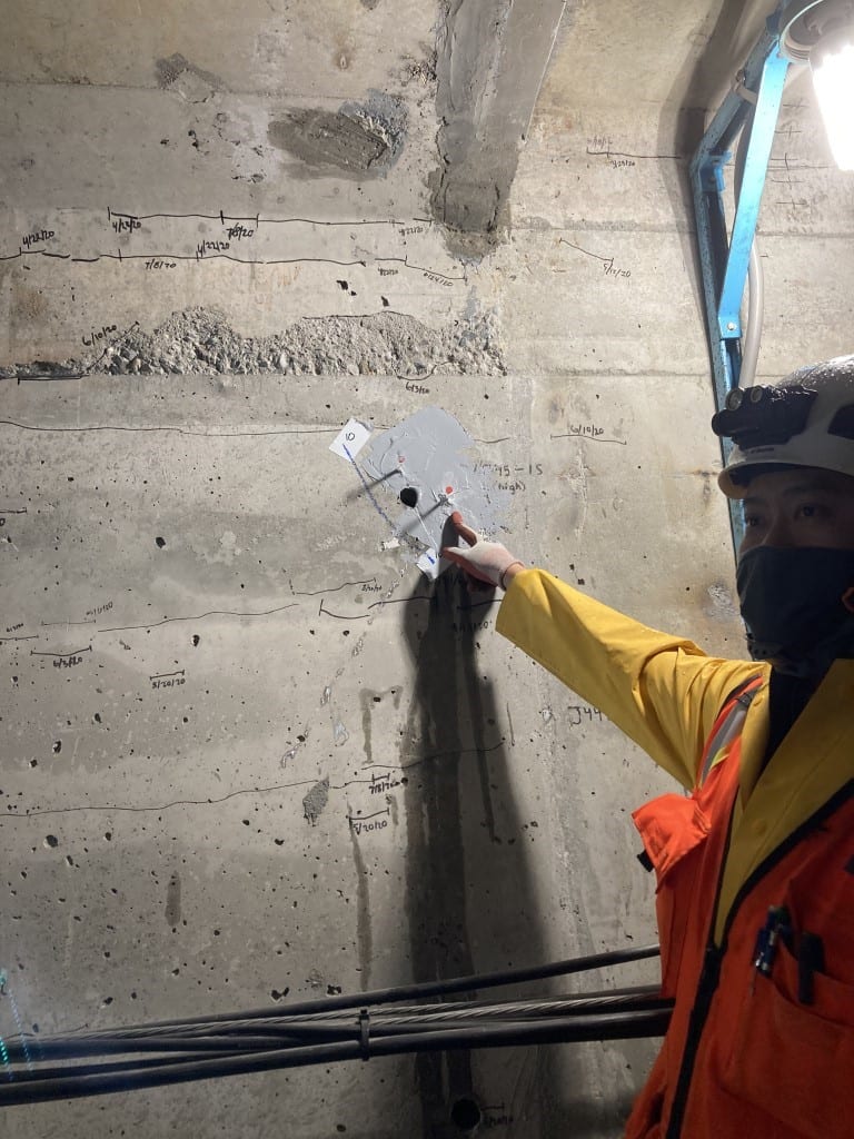 SDOT Project Manager Kit Loo showing the epoxy injections inside the bridge