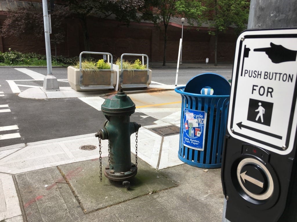 Push button for a pedestrian walk signal