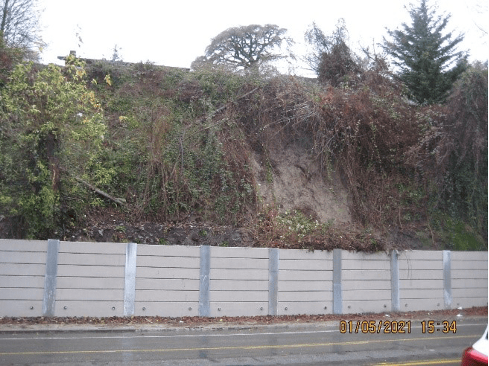 This retaining wall on Rainier Ave S helped prevent a landslide from reaching the sidewalks or street!