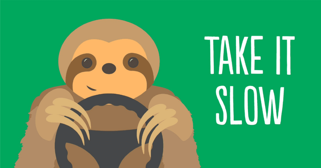 Image with sloth that says "Take it Slow" 