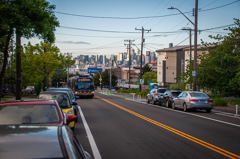 A bus driving up the recently-repaved SW Avalon Way. Photo Credit: SDOT Flickr. 