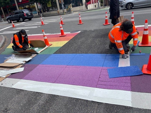 Repairing a rainbow crosswalk in Capitol Hill. Photo Credit: SDOT.