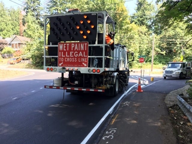 SDOT truck re-striping the road