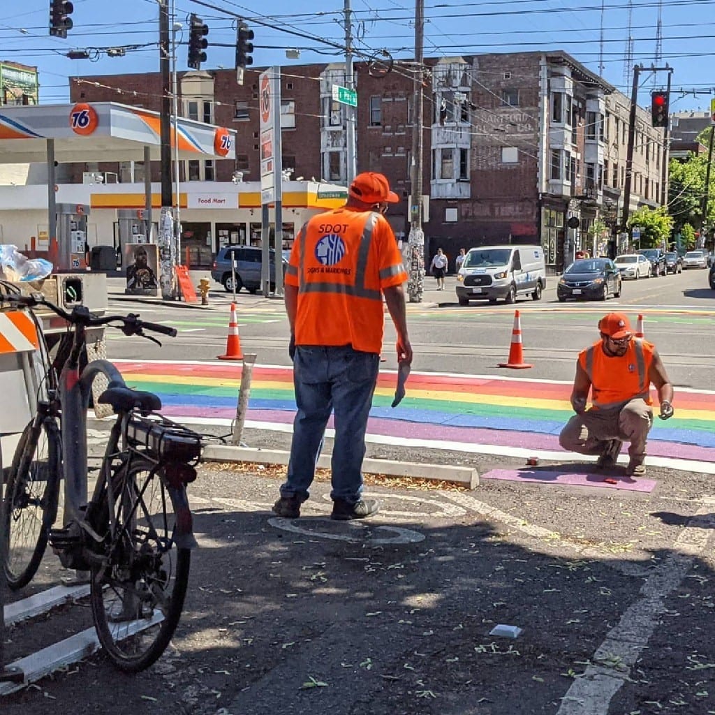 Crews re-paint a rainbow crosswalk