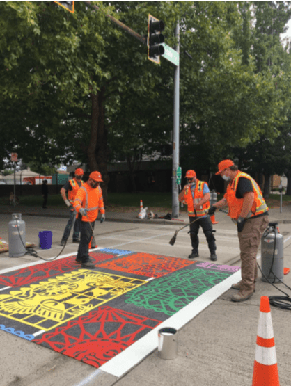 Crews install new crosswalk