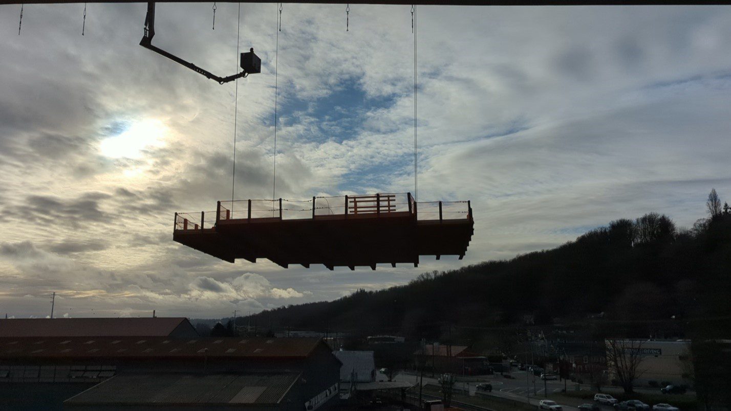 Views of the first platform rising into place.