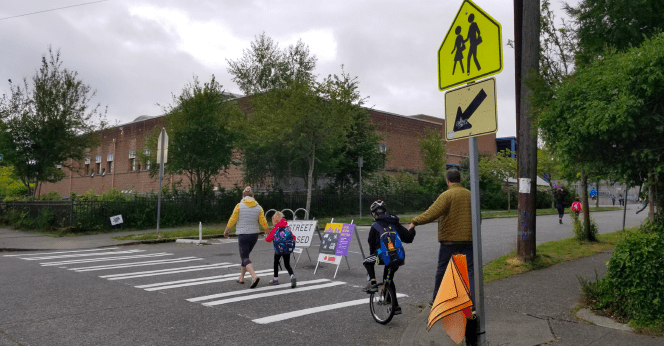 Students crossing School Streets at Whittier Elementary School. Photo Credit: SDOT. 