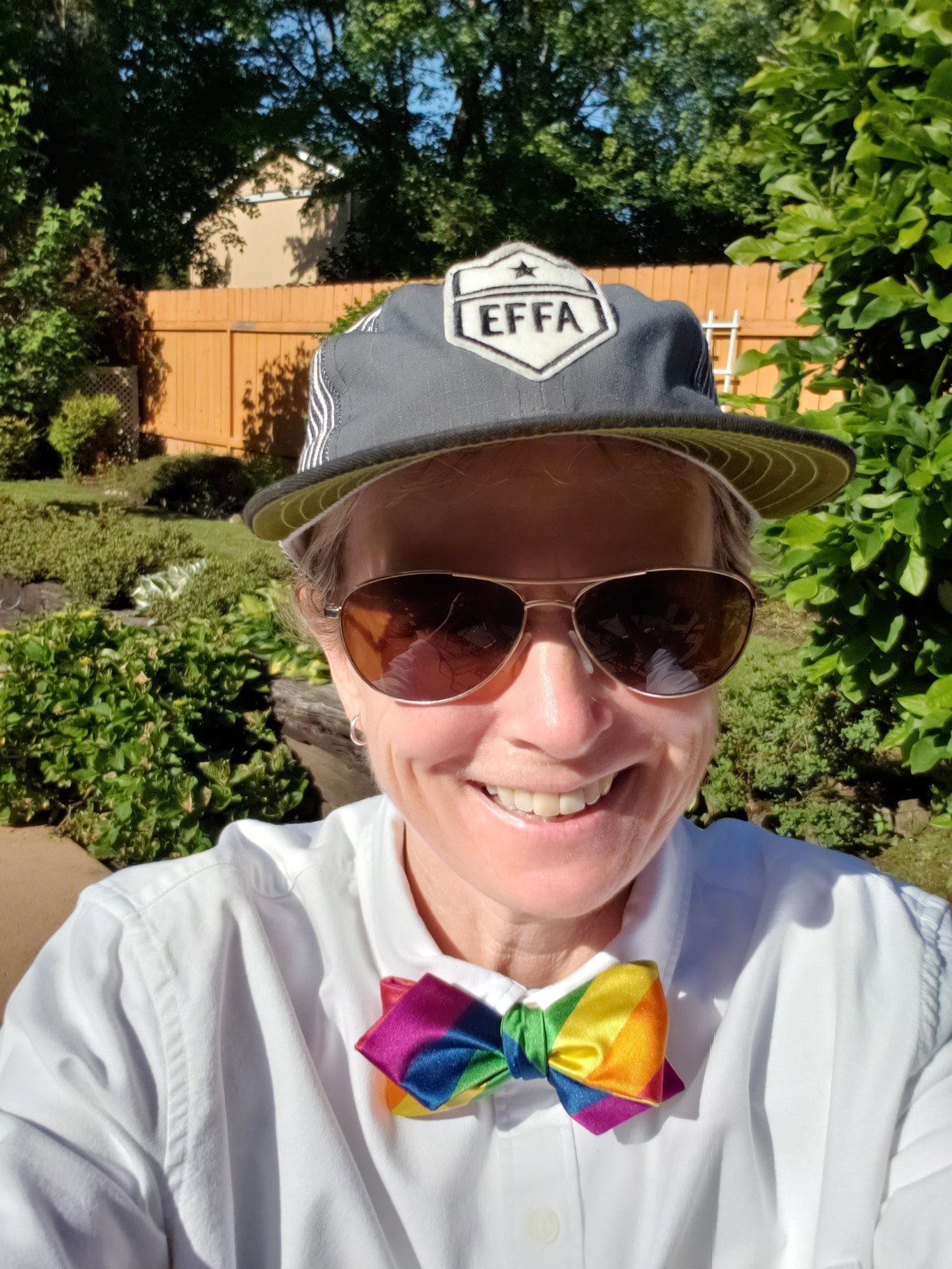 Photo of Holly Krejci, who is a Talent Management Partner with the Seattle Department of Transportation's People, Culture and Logistics Group, with the City of Seattle. Holly smiles at the camera on a sunny day outside.