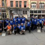 Community volunteers smile for a photo during their work in Pioneer Square as part of the One Seattle Day of Service on Saturday, May 21.
