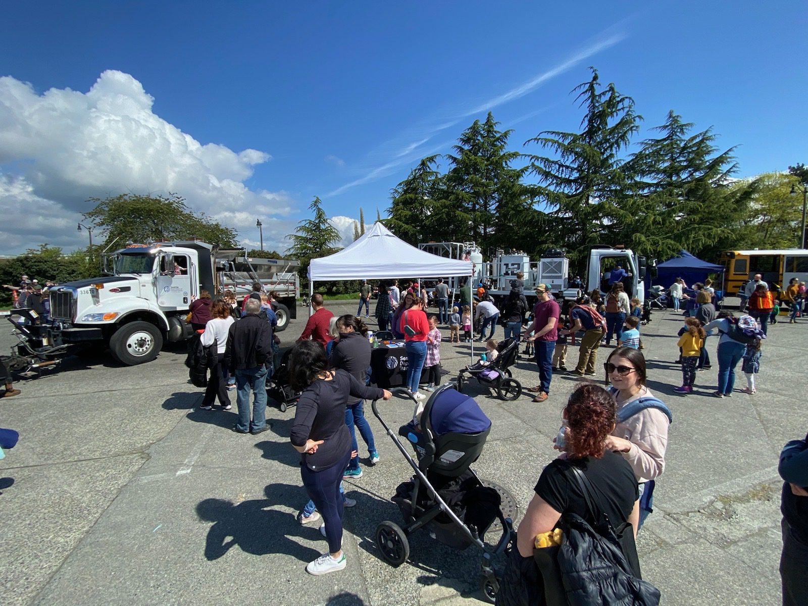 Event participants wait to check out SDOT's two vehicles and speak with our team at the Touch-A-Truck event.