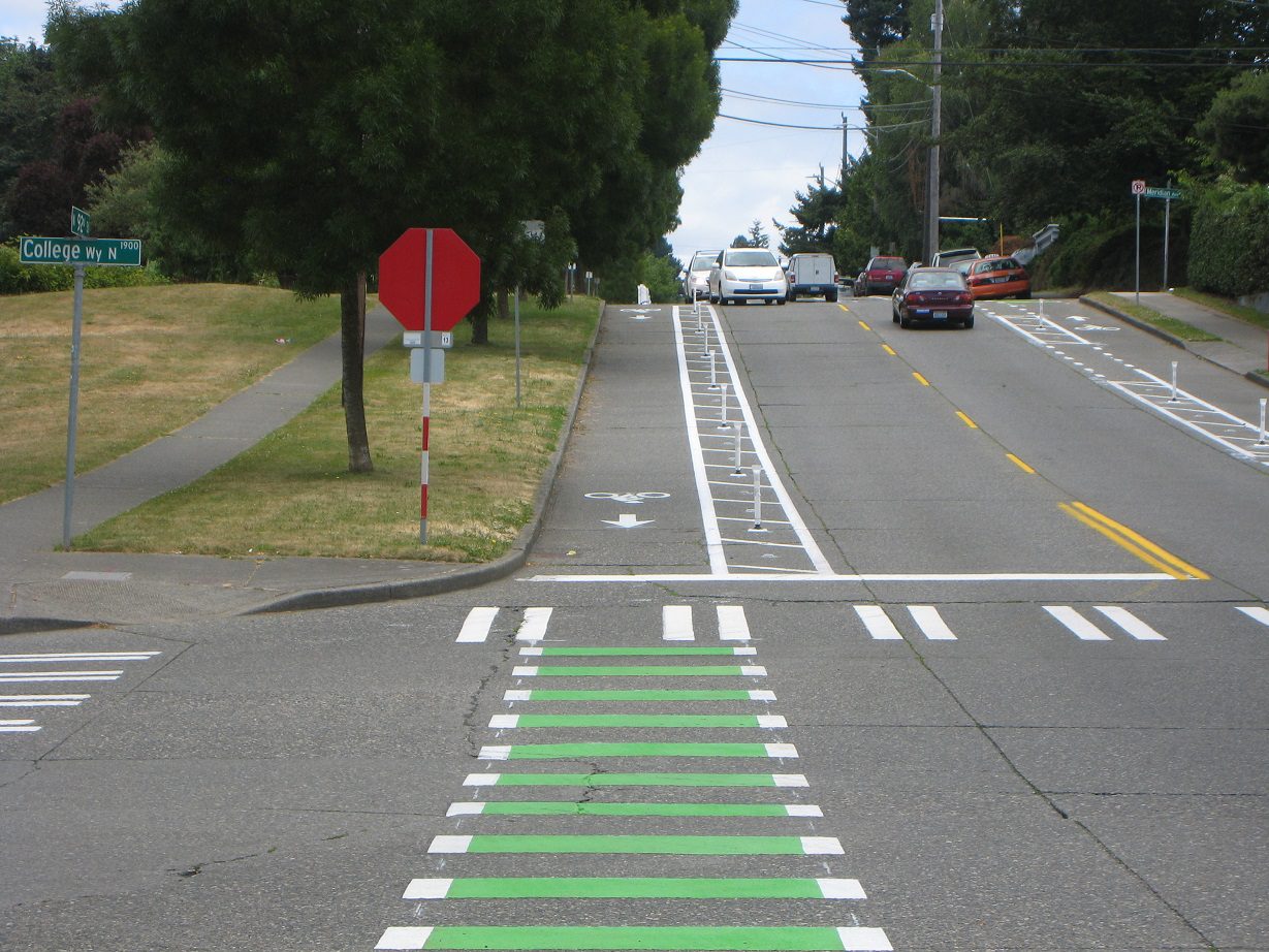Plastic flexible posts provide separation for the protected bike lane on N 92nd St in the Licton Springs neighborhood.