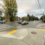 New ADA curb ramps and sidewalk at NE 70th St and on Sand Point Way NE. Photo Credit: SDOT.