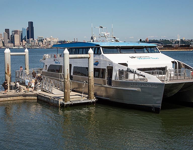 People board the West Seattle Water Taxi at Seacrest dock in West Seattle. Photo credit: King County Metro and Ned Ahrens.