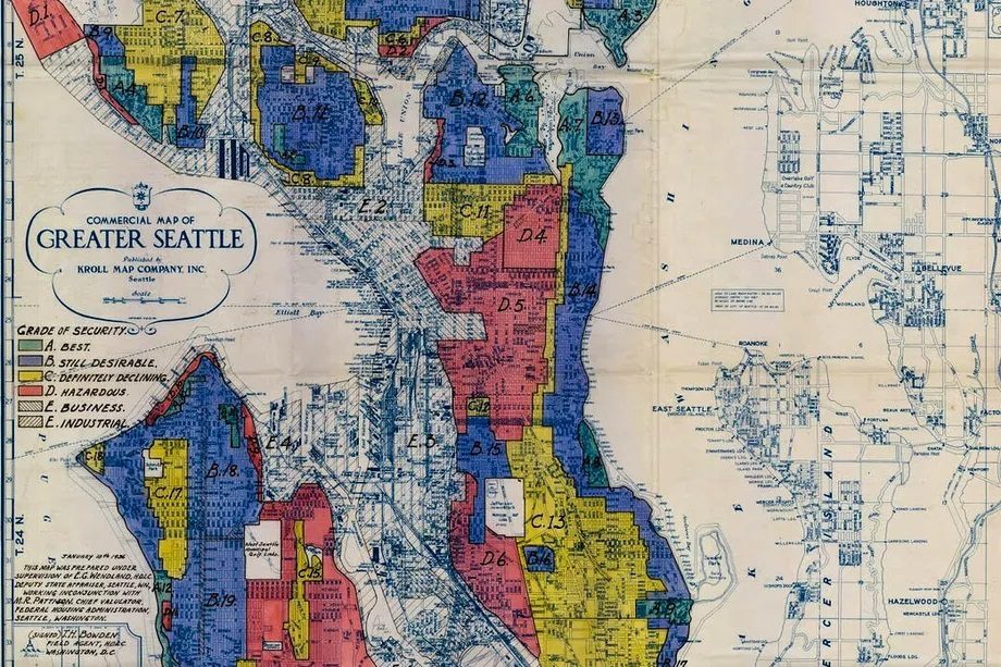 A historical map of the city of Seattle with colors filling in certain areas, including red, blue, yellow, and green.