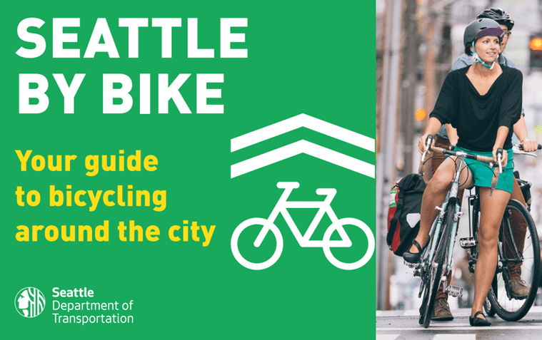 The cover graphic of the Seattle By Bike guide which features the title on the left on a solid green background, and an image on the right of a person on a bike wearing a helmet.