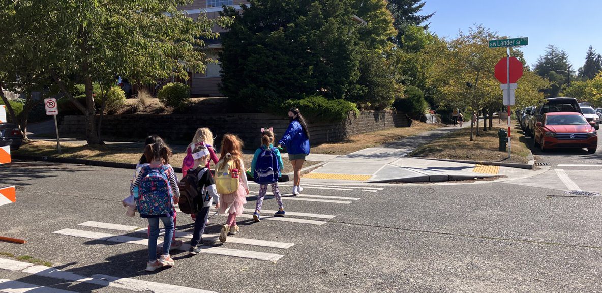 Students crossing the street near Lafayette Elementary School at an intersection where we installed all-way stop signs.