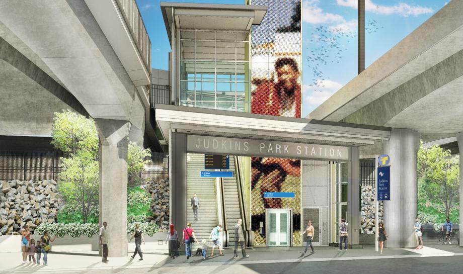 A rendering of a light rail station with people walking in the foreground and trees and light rail tracks in the background. The station is titled 
