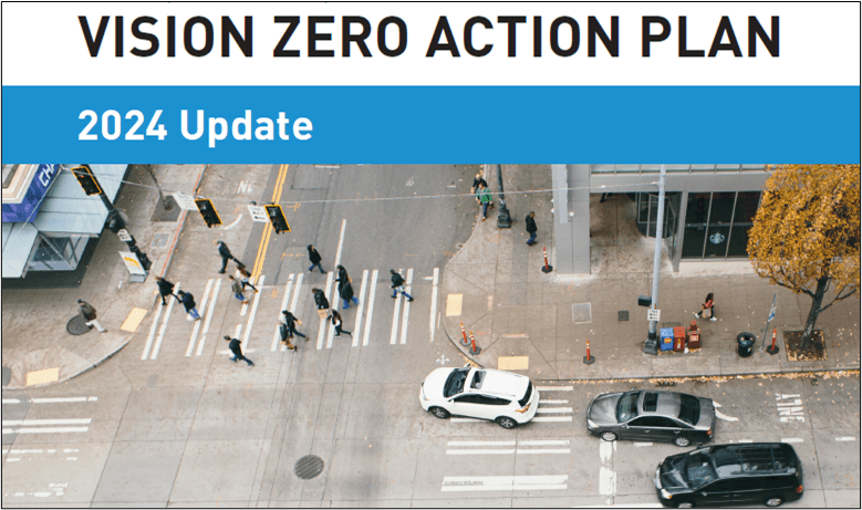 Birds-eye view of a car turning through an intersection with people crossing the street. Large lettering says 