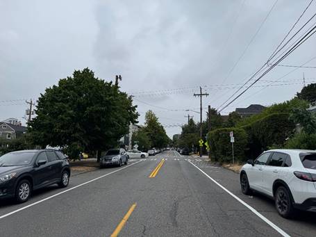 After improvements on 14th Ave and E Marion St with new marked crosswalks, no parking signs, and painted curb bulbs.