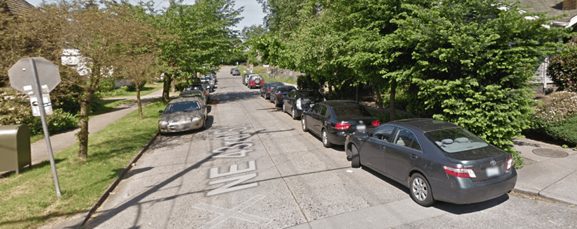 Before improvements at 8th Ave NE and NE 43rd St in the U District. Photo Credit: Google. A car is parked close to the intersection.