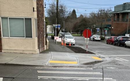 After improvements at 2nd Ave NE and Woodlawn Ave NE in the Green Lake neighborhood, which included a concrete bulb that prevents parking within 30 feet of the stop sign.